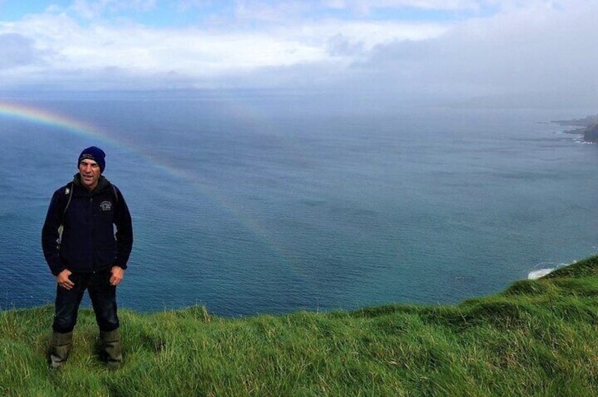Local farmer guides stunning walk along the Cliffs of Moher County Clare Ireland