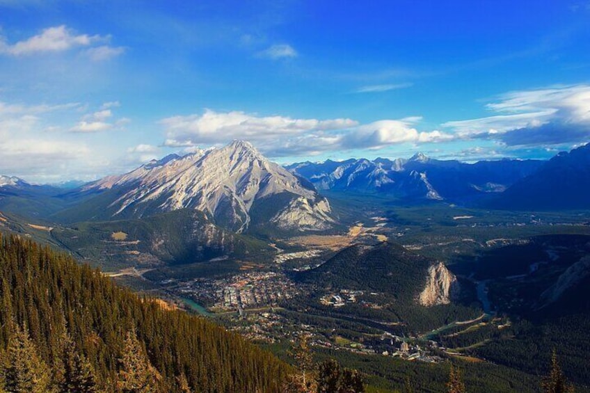 Listen to a Tour Guide as You Drive & Walk with our Discover the Rockies Package