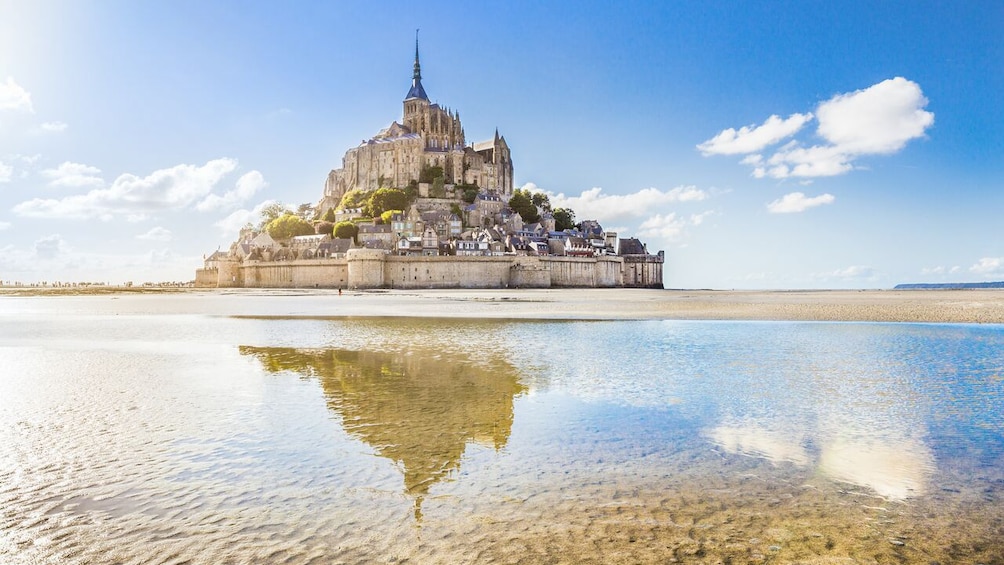 Exterior view of Mont Saint-Michel during sunny day.