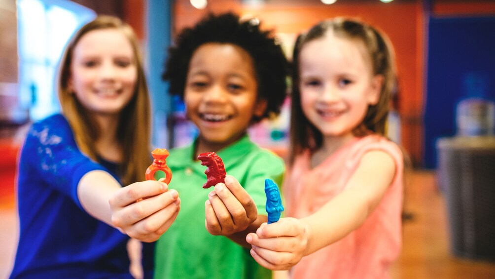 Children posing with souvenirs.