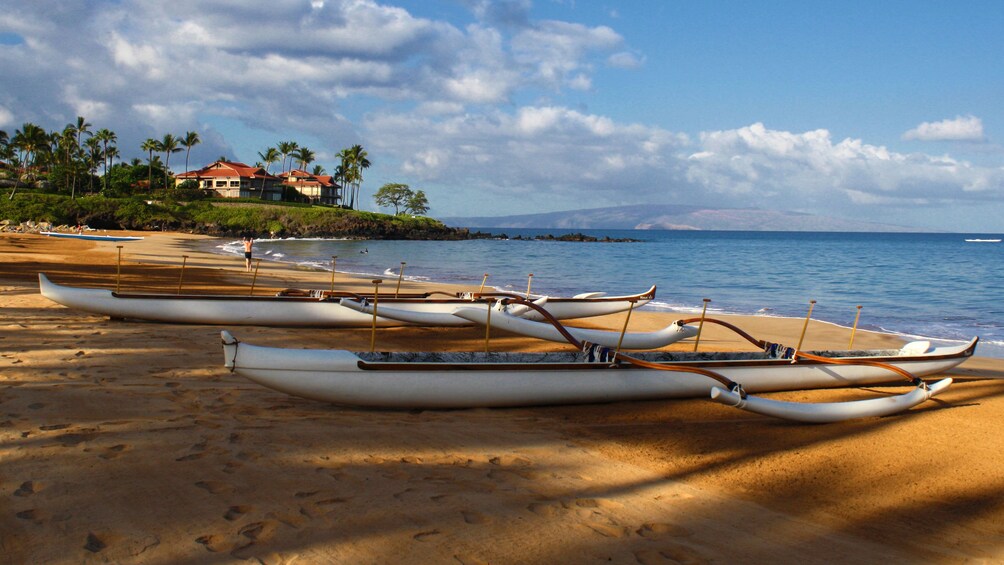 Outrigger canoes on the beach in Maui