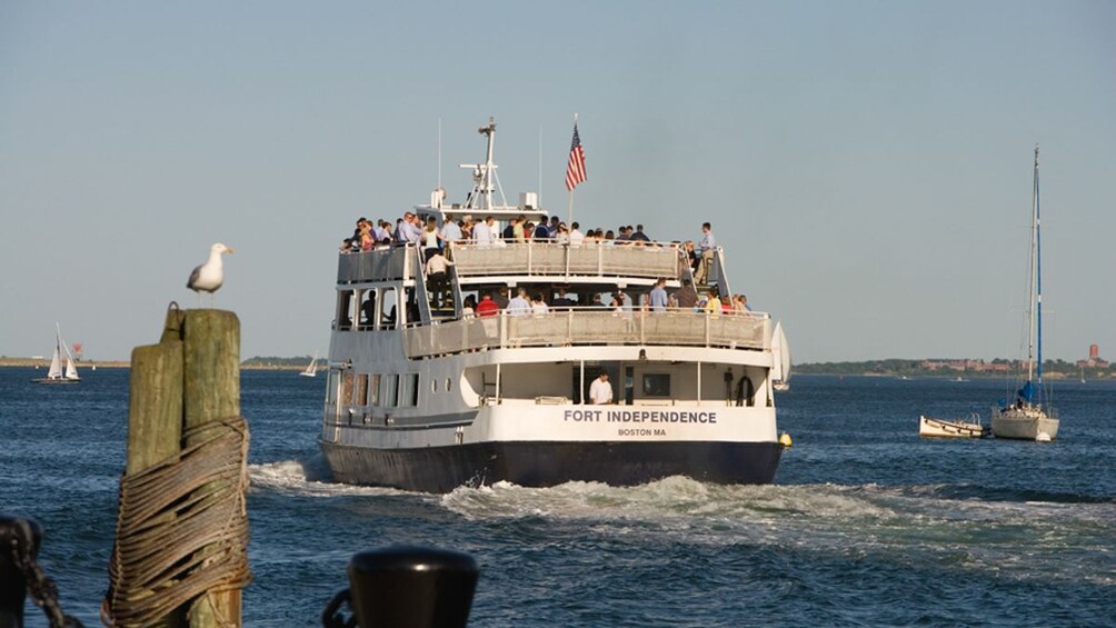 Cruise boat in motion on water.