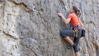 Show item 1 of 8. Woman on the Half-Day Rock Climbing Tour in Whistler BC