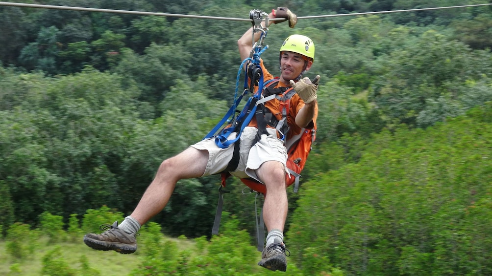 Have fun and enjoy the ride ziplining from Kualoa Ranch