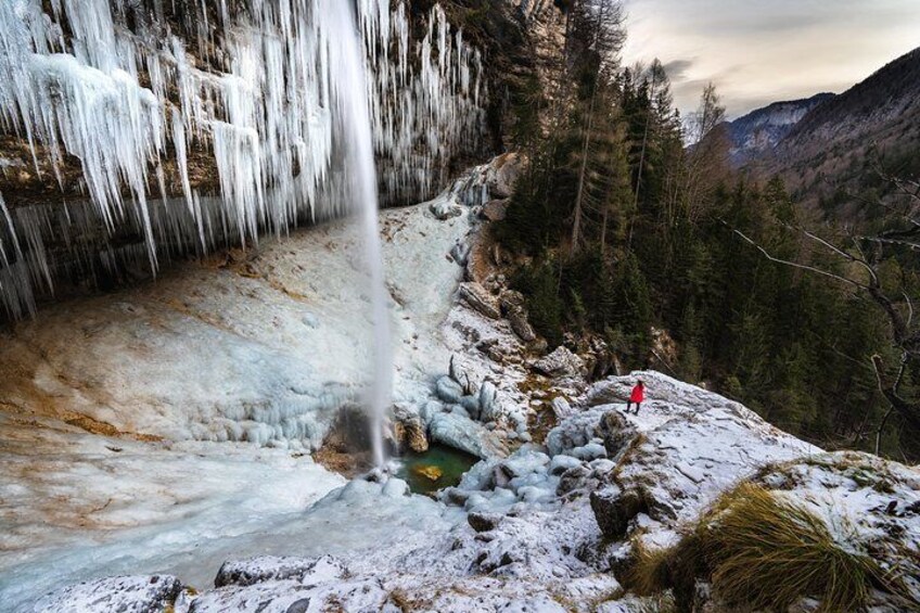 Under the waterfall