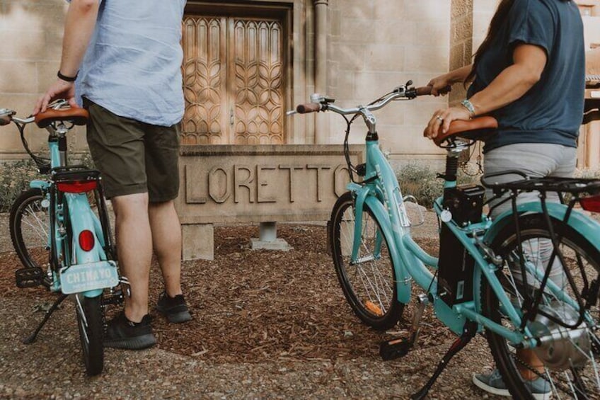 Loretto Chapel is located next door to our E-Bike Shop.