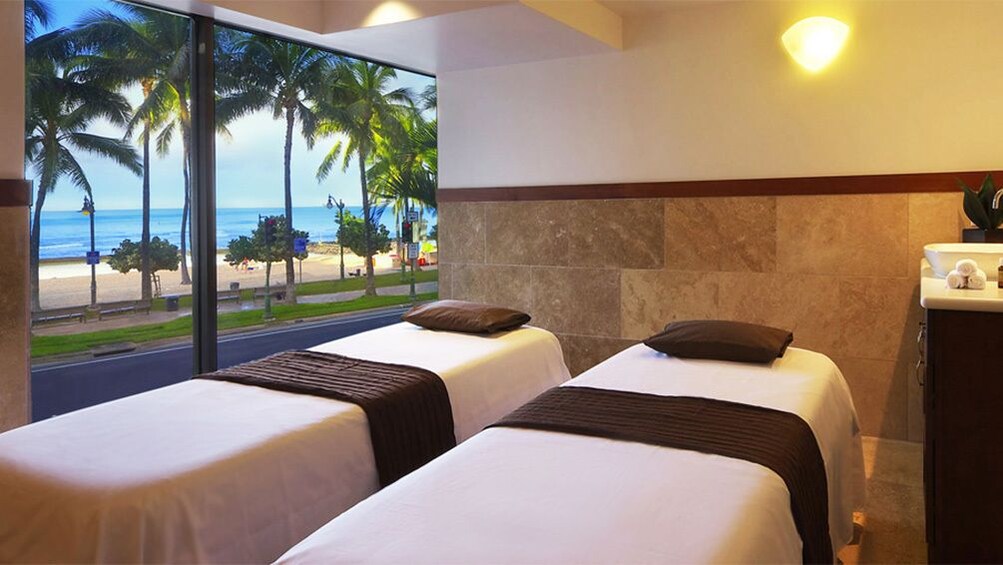 Twin massage tables for couples treatment at Kaila Spa