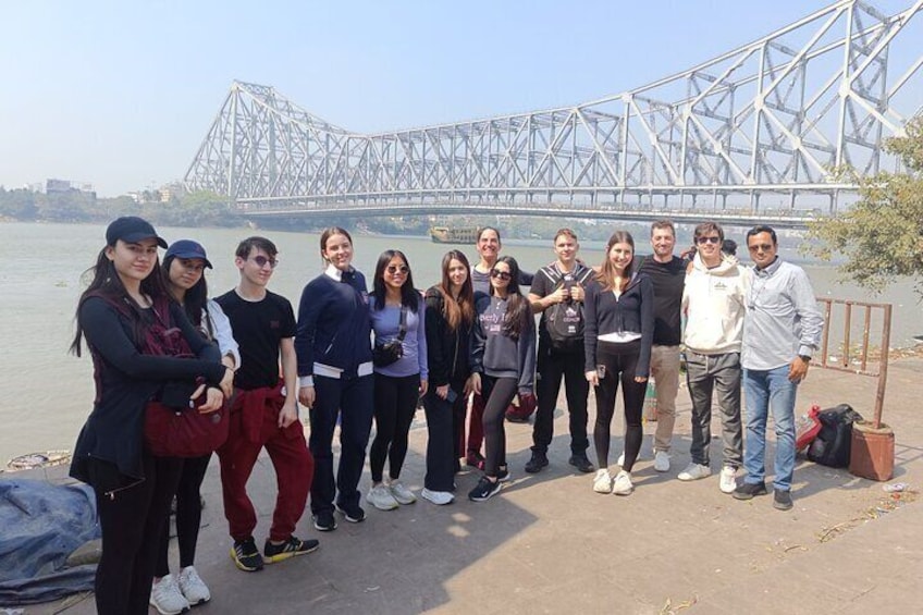 Guests from TASIS Switzerland in front of the Howrah Bridge