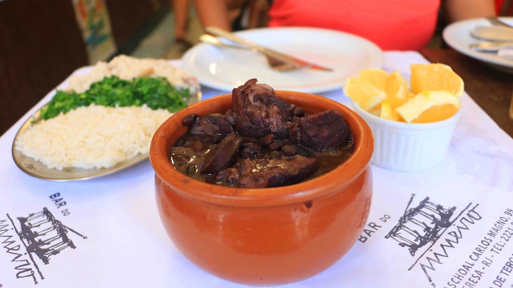 Bowls of Brazilian food on a table