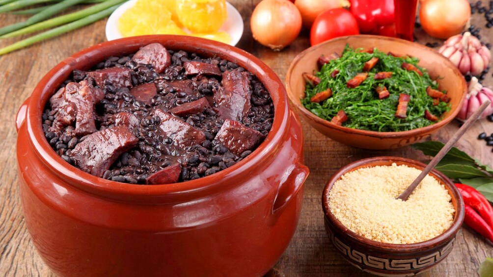 Bowls of Brazilian food on a table