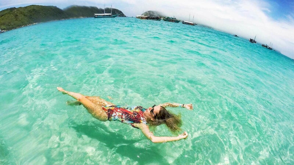 Woman swimming in Arraial do Cabo 