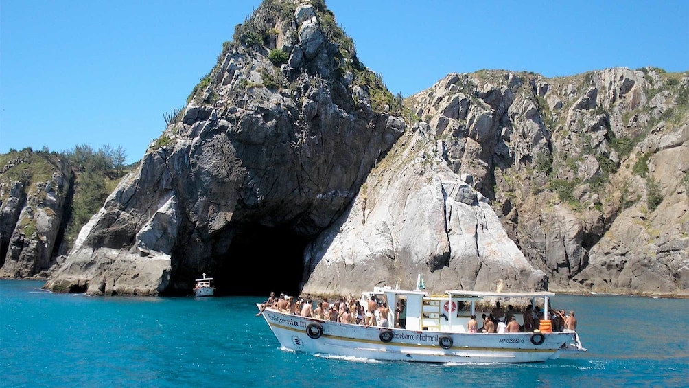 View of the tourists on a boat cruise in Arraial do Cabo 