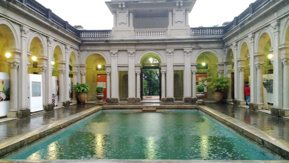 View of reflecting pool during rain at Parque Lage in Rio de Janeiro