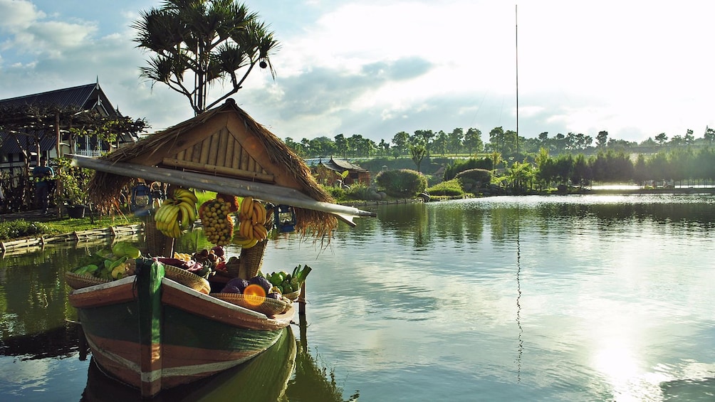 River view of area with small boat pictured.