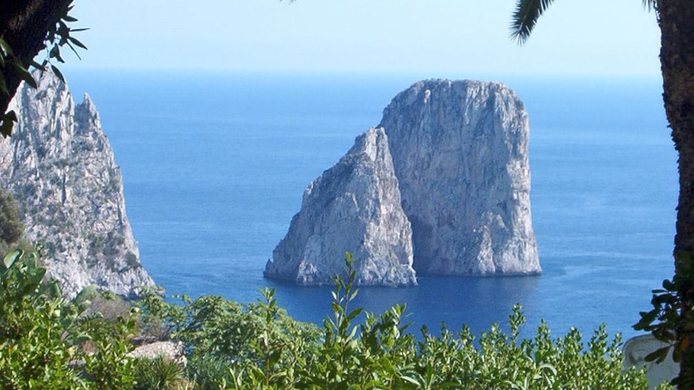 tall standing rocks near the coast in Italy