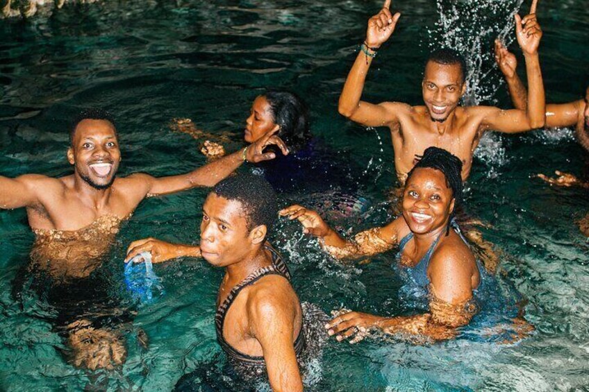 Swim in the crystal clear healing cave water in an ancient sacred cave