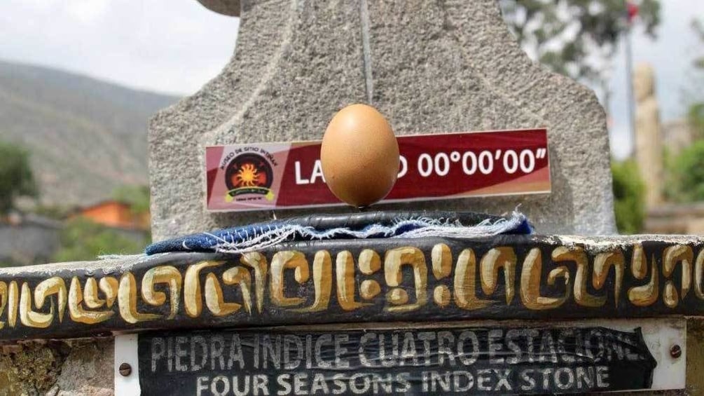 Egg balancing on end at zero degrees latitude in Ecuador