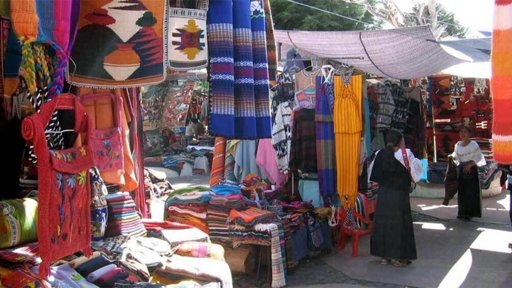 Colorful textiles at a market in Otavalo