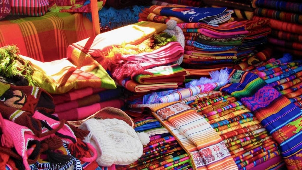 Colorful textiles at a market in Otavalo