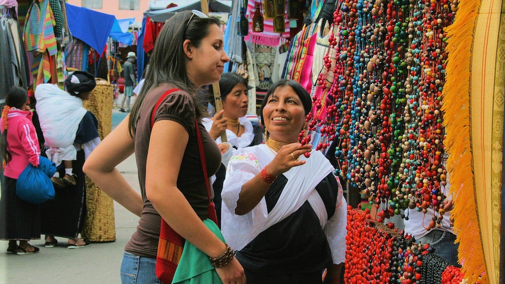 Woman shopping at a market in Otavalo