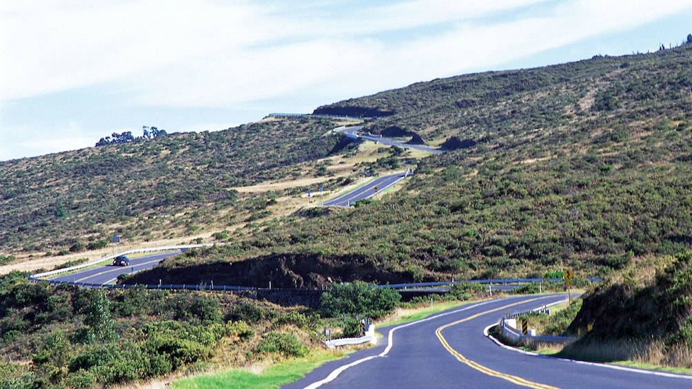 Curvy road to Haleakala Volcano in Maui