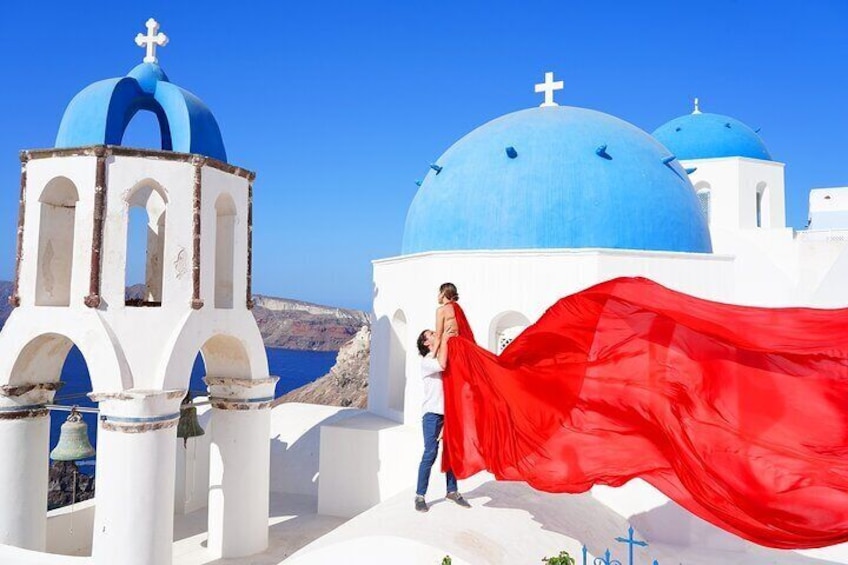 Private Flying Dress Photoshoot in Santorini
