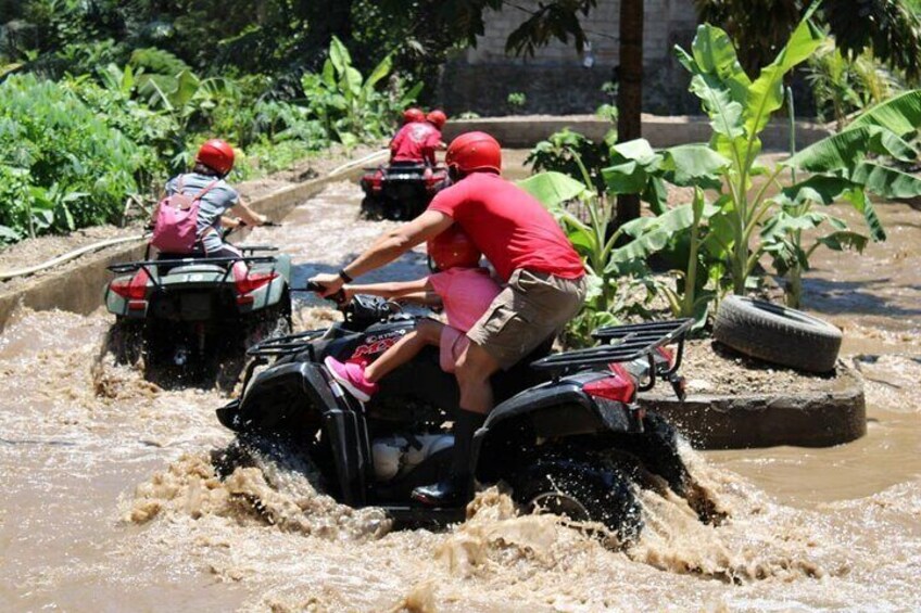 Ride ATV on the water muddy