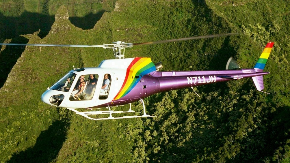 Close view of a helicopter flying above Kauai 