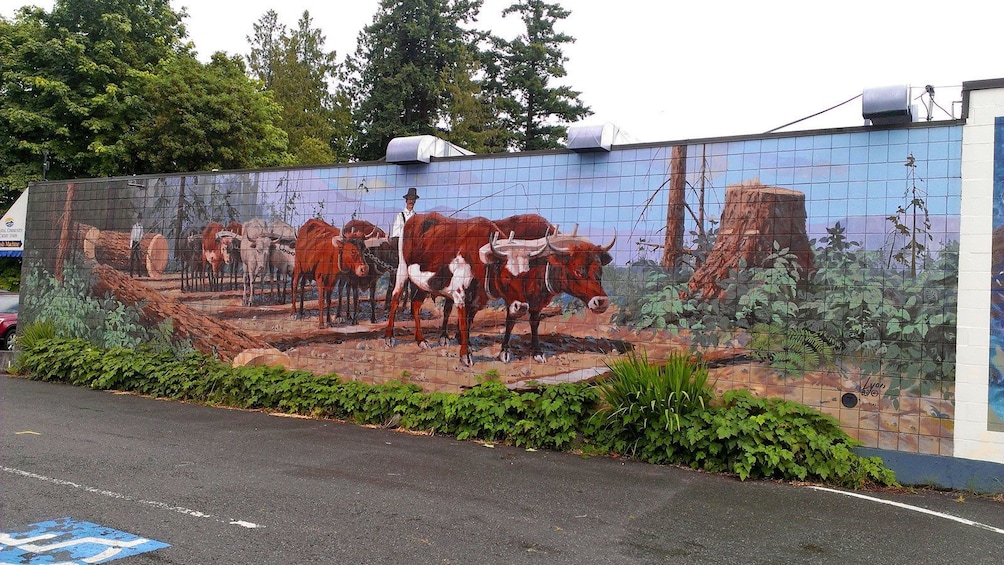 tile art of herded cattle in Victoria BC
