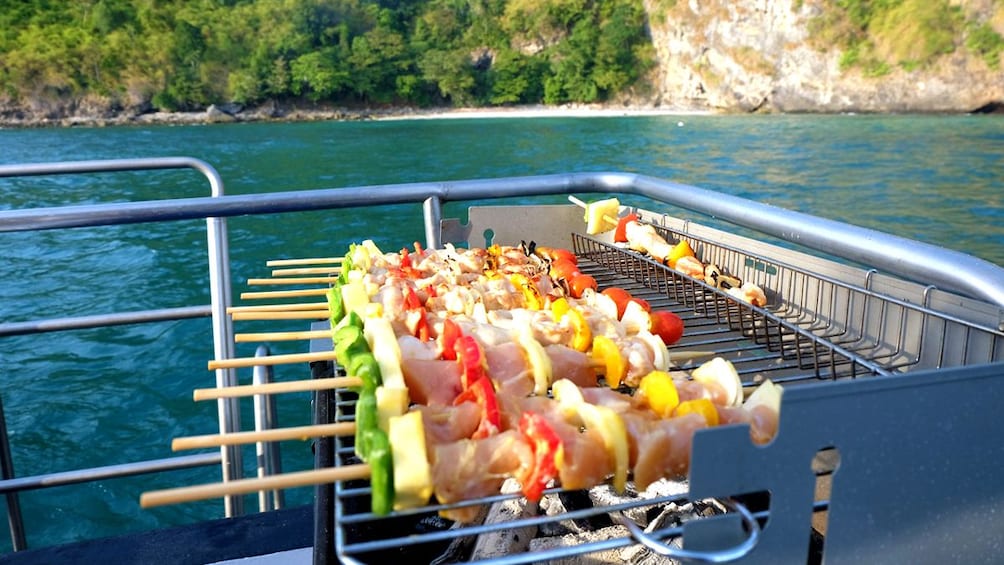 grilling skewers on a Catamaran in Thailand