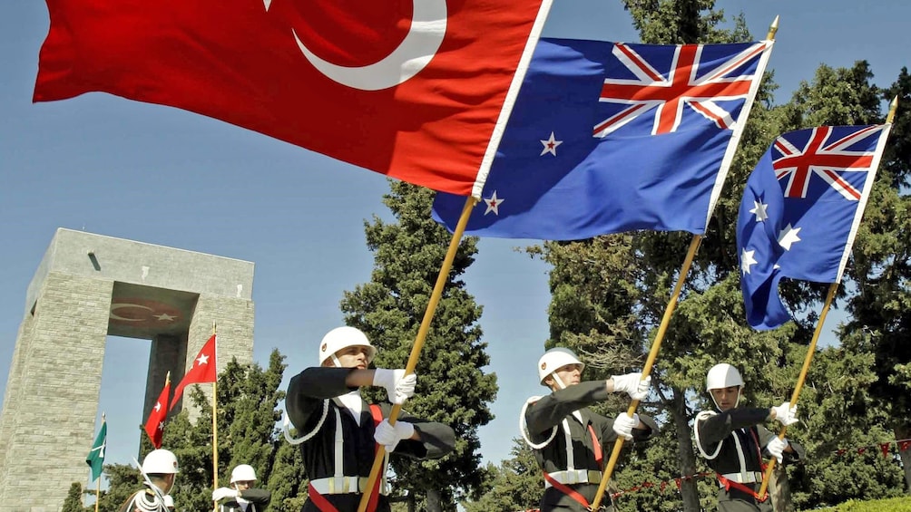 men marching with flags