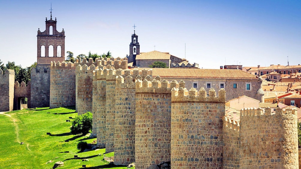 stone sentry towers along the castle walls in Spain