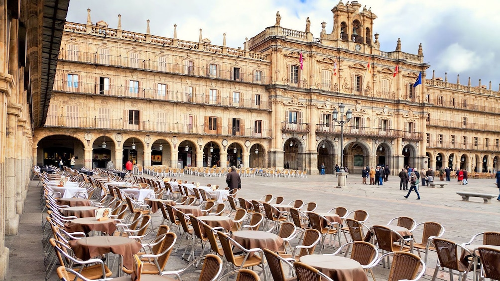 Show item 5 of 10. seating and tables outside the city hall in Spain