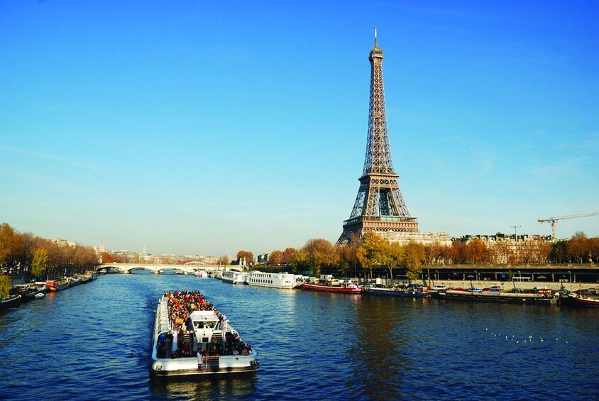 Paris Full-Day Tour with Eiffel Tower, Seine Cruise & Louvre