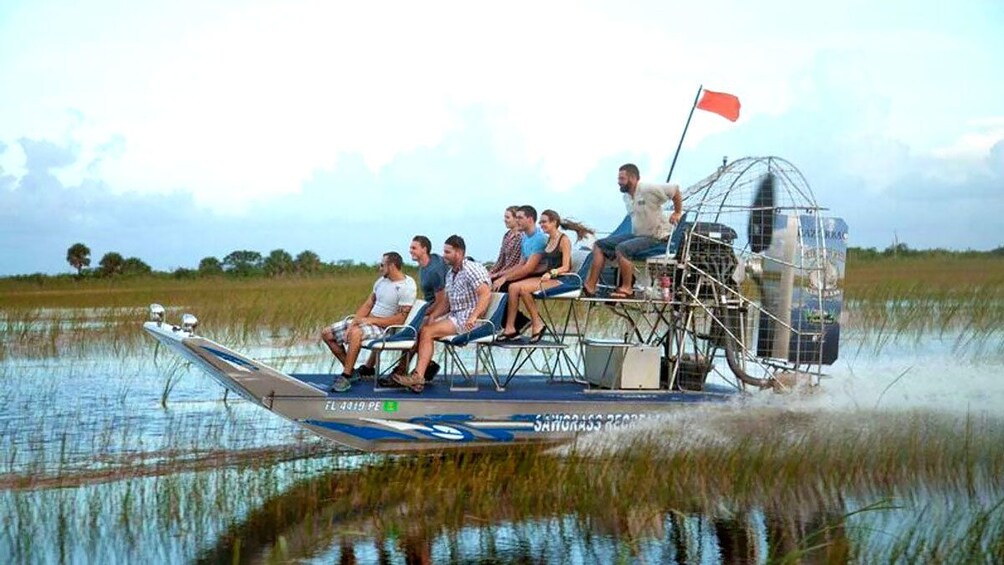 airboat speeding through the water in Florida