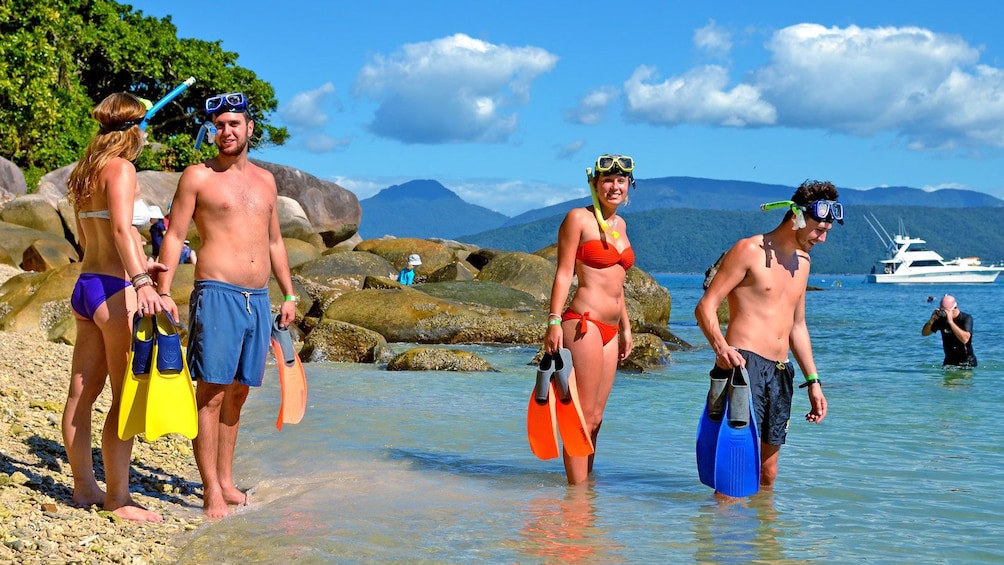 couples getting ready to snorkel in Australia