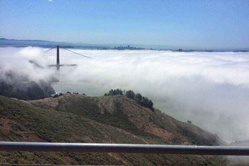 The Golden Gate Bridge in fog, from the Marin County Side