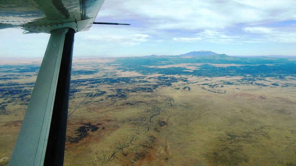 View of a planes wing over Northern Arizona
