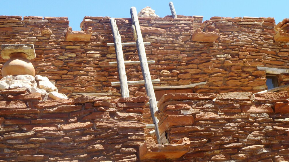 A Hopi ladder on a stone structure in the Grand Canyon
