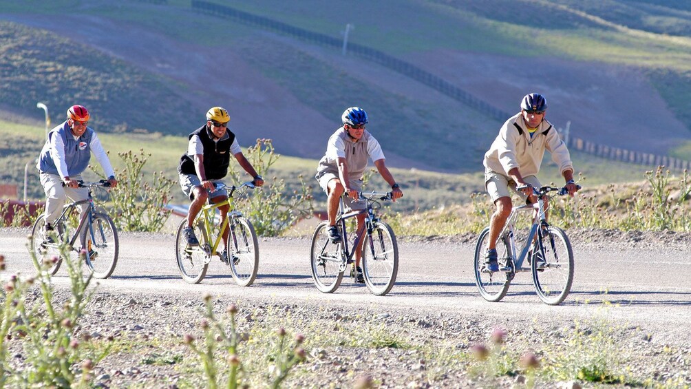 biking along a narrow road in Argentina