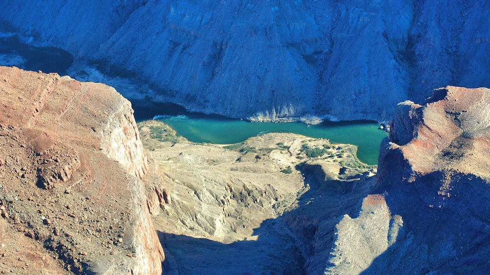Beautiful aerial view of Grand Canyon during the day with Colorado River seen below.