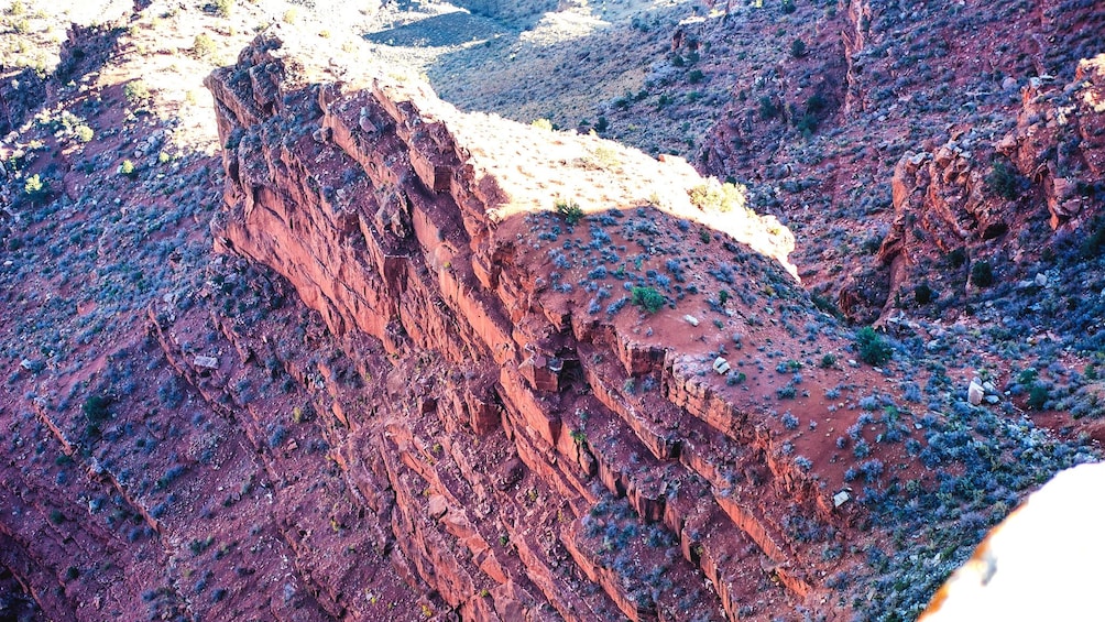 Aerial view of Grand Canyon rock formations from helicopter.