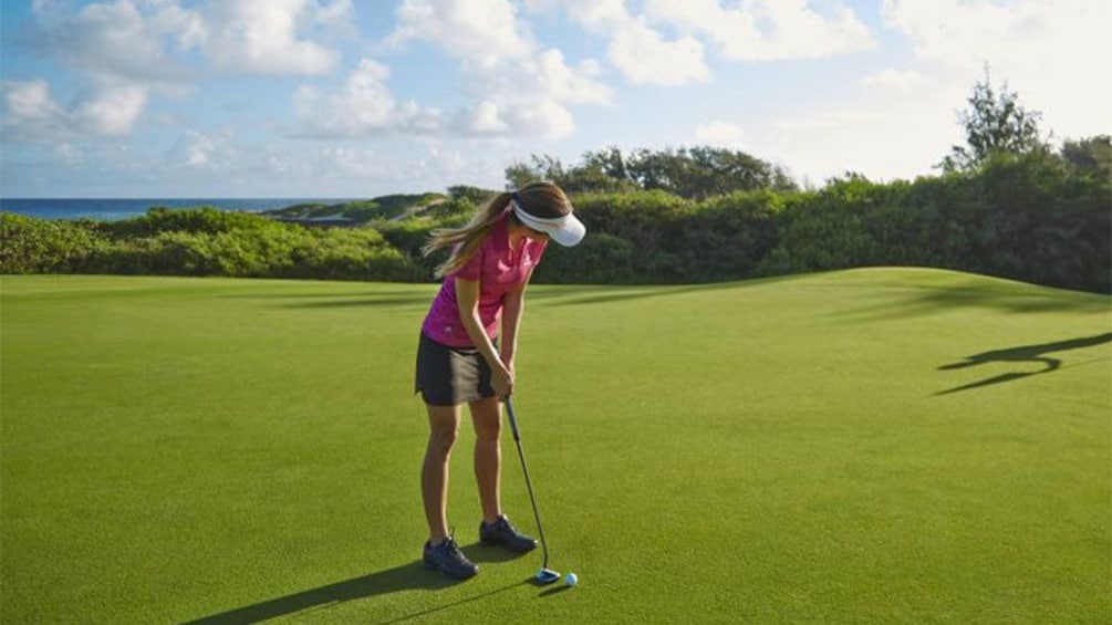 Aim for a hole in while during a round of golf in Oahu