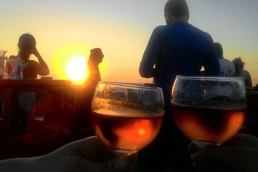 Aperitif at sunset, with the Cinque Terre in the background