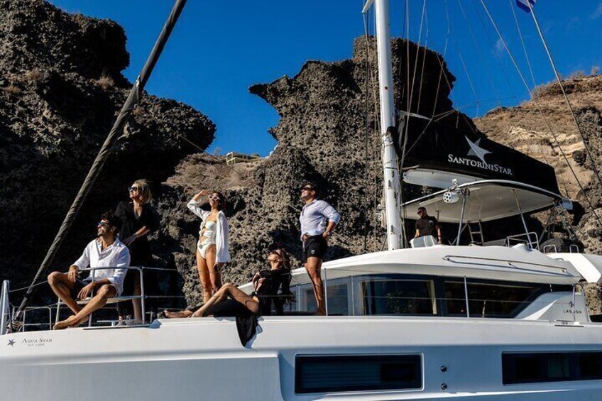 Half-Day Exclusive Catamaran Cruise in Santorini with Meal and Open Bar