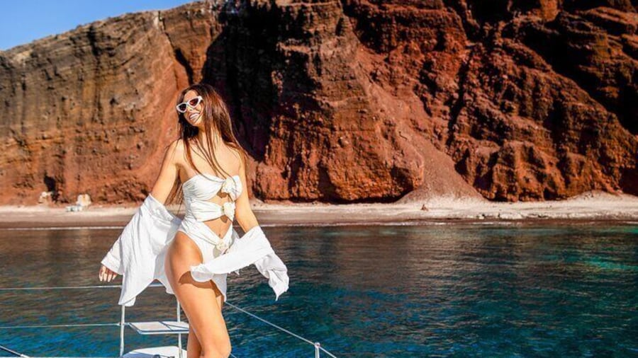Half-Day Exclusive Catamaran Cruise in Santorini with Meal and Open Bar