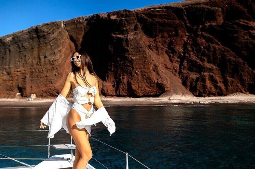 Half-Day Exclusive Catamaran Cruise in Santorini with Meal and Open Bar