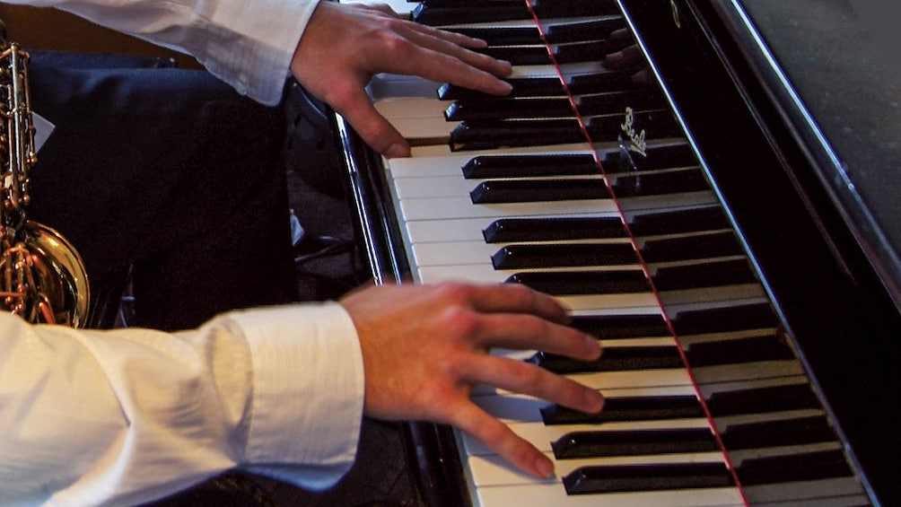 Close up of jazz musician playing piano.