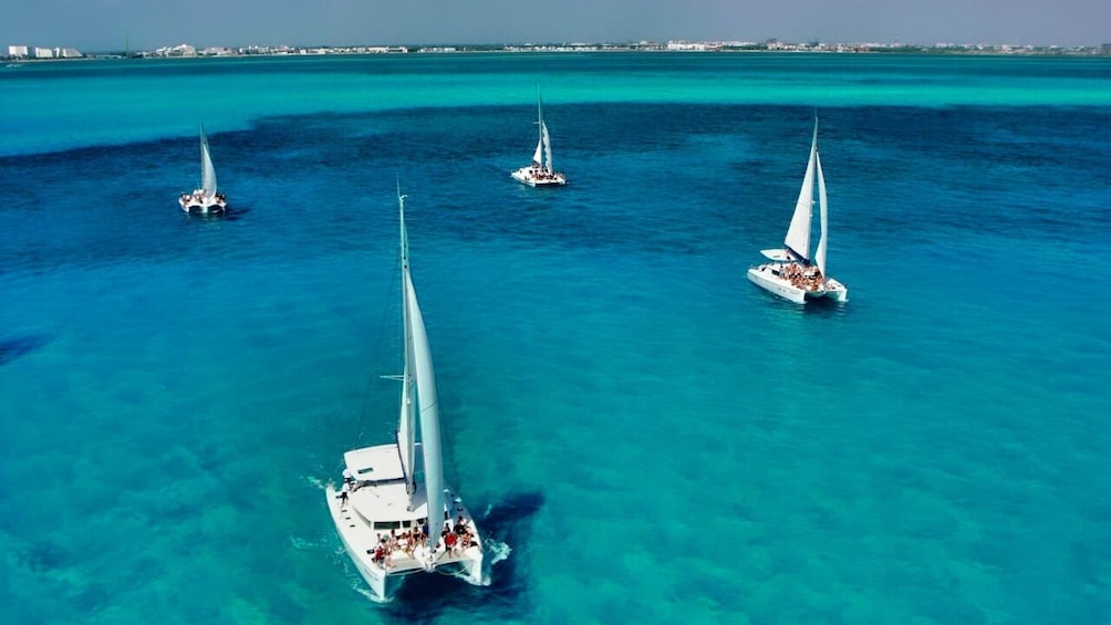 Isla Mujeres Catamaran Cruise with Snorkeling & Beach Club