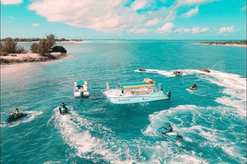 Zip around the La famille ship and visit the smaller pristine cays